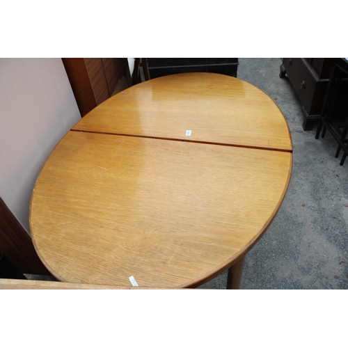 2808 - A RETRO TEAK OVAL EXTENDING DINING TABLE, 54