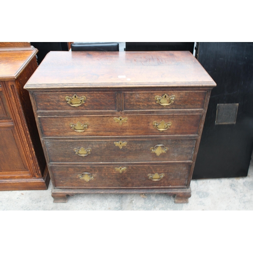 2812 - A GEORGE III OAK CHEST OF TWO SHORT AND THREE LONG GRADUATED DRAWERS, 39