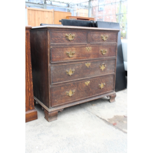 2812 - A GEORGE III OAK CHEST OF TWO SHORT AND THREE LONG GRADUATED DRAWERS, 39