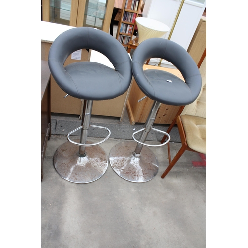 2966 - A PAIR OF PUMP ACTION STOOLS