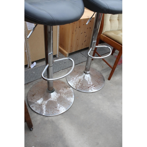 2966 - A PAIR OF PUMP ACTION STOOLS