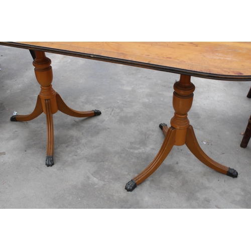 2975 - A TWIN PEDESTAL YEW WOOD COFFEE TABLE