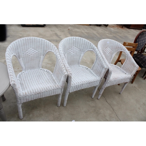 2980 - THREE WICKER CONSERVATORY CHAIRS AND A COMMODE CHAIR