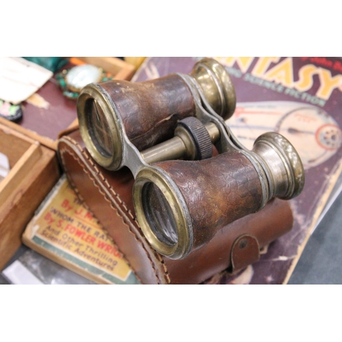 145 - A QUANTITY OF BINOCULARS TO INCLUDE A PAIR OF VINTAGE FOLDING OPERA GLASSES, ZIPPO LIGHTER, ETC.,