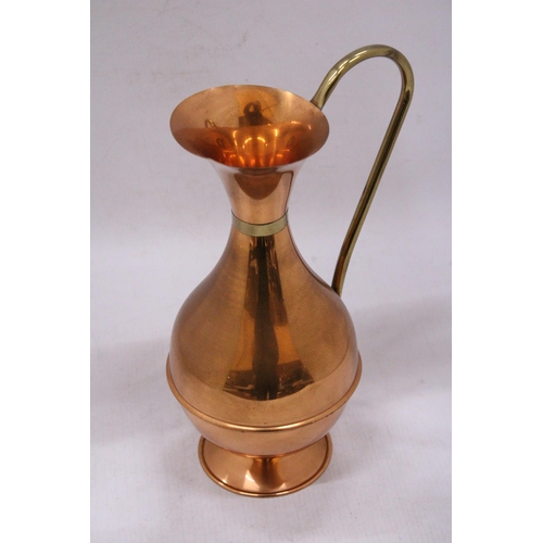 146 - A VINTAGE STOVE TOP COPPER KETTLE TOGETHER WITH A LOMBARD COPPER JUG