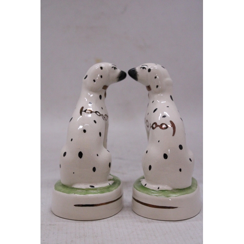 154 - A PAIR OF STAFFORDSHIRE WARE DALMATIAN FIGURES