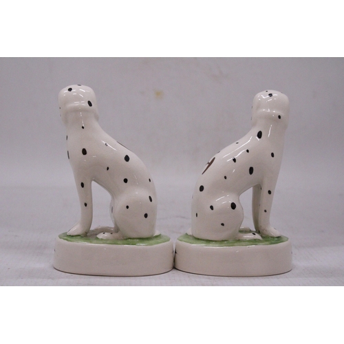 154 - A PAIR OF STAFFORDSHIRE WARE DALMATIAN FIGURES