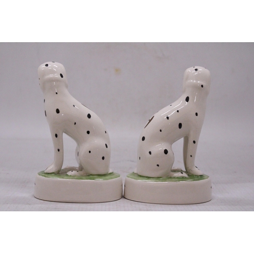 154 - A PAIR OF STAFFORDSHIRE WARE DALMATIAN FIGURES