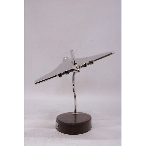 160 - A CHROME VULCAN BOMBER ON A WOODEN BASE