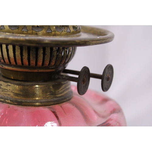 162 - A CRANBERRY AND BRASS OIL LAMP BASE