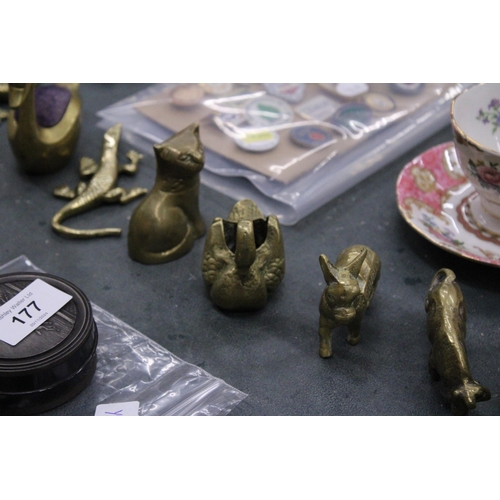 175 - A LARGE QUANTITY OF BRASS ANIMALS TO INCLUDE A SWAN PIN CUSHION, ELEPHANT, CAT, DONKEY, LIZARD, ETC.... 