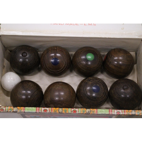 186 - A SET OF ANTIQUE TREEN LIGNUM VITAE MINI CARPET BOWLS