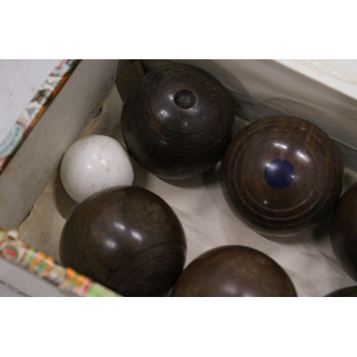 186 - A SET OF ANTIQUE TREEN LIGNUM VITAE MINI CARPET BOWLS