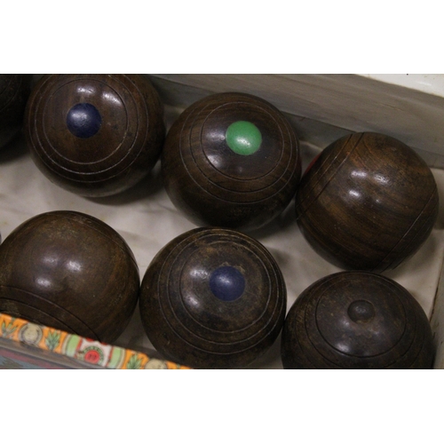 186 - A SET OF ANTIQUE TREEN LIGNUM VITAE MINI CARPET BOWLS