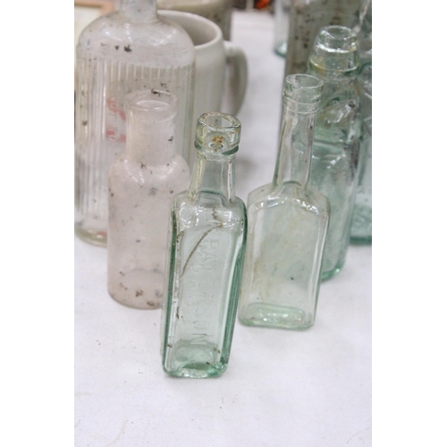 199 - A QUANTITY OF GLASS CODD BOTTLES TO INCLUDE A SALT GLAZED STONEWARE BOTTLE, ETC.,