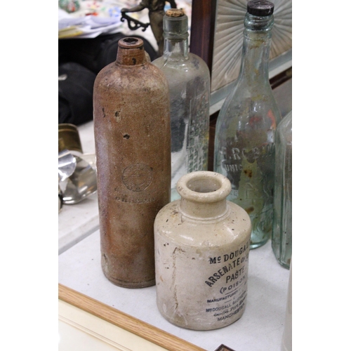 199 - A QUANTITY OF GLASS CODD BOTTLES TO INCLUDE A SALT GLAZED STONEWARE BOTTLE, ETC.,