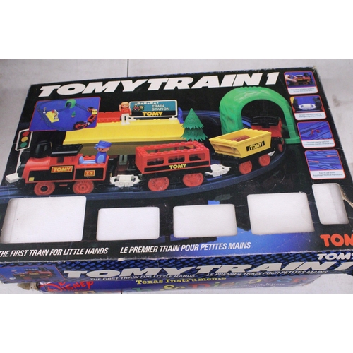 488 - THREE CHILDREN'S TOYS TO INCLUDE, THE DISNEY FRIENDS 'TOUCH AND DISCOVER', TOMY TRAIN AND WOODEN MAG... 