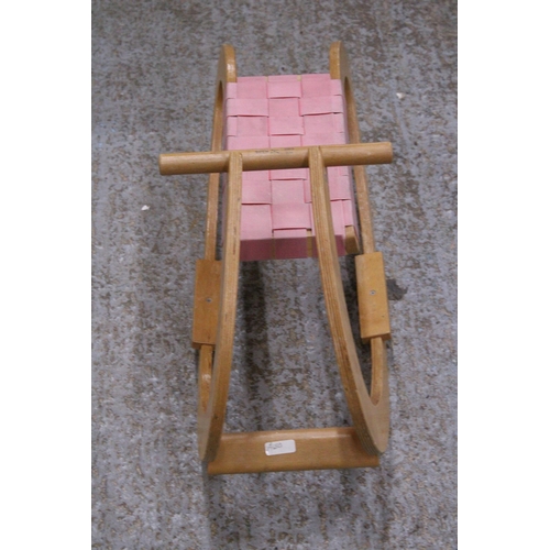 553A - A YOUNG CHILD'S WOODEN ROCKER