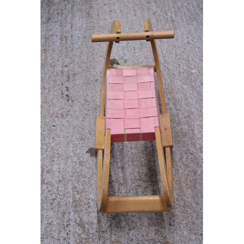 553A - A YOUNG CHILD'S WOODEN ROCKER