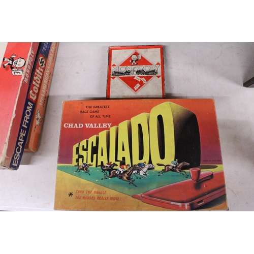 565 - FIVE VINTAGE BOARD GAMES TO INCLUDE ESCALADO, COLDITZ, MONOPOLY, ETC