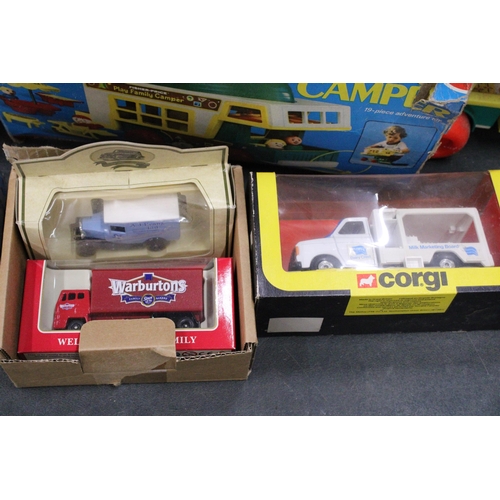 590A - FIVE BOXED VEHICLES TO INCLUDE A CORGI MILK MARKETING BOARD FORD TRANSIT - ALL BOXED PLUS A FISHER P... 