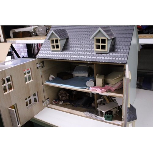 592A - A DOLL'S HOUSE CONTAINING A QUANTITY OF FURNITURE