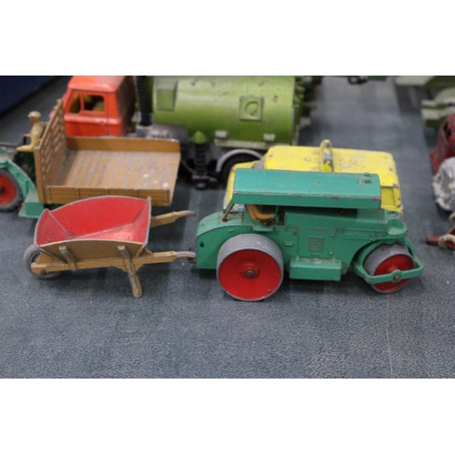 597 - SEVEN VINTAGE DINKY VEHICLES TO INCLUDE A JOHNSTON ROAD SWEEPER, STEAM ROLLER, MOTOCART, WHEEL BARRO... 