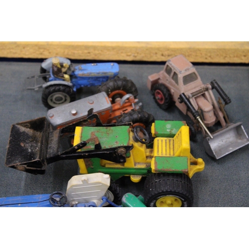 597A - A COLLECTION OF VINTAGE TRACTORS TO INCLUDE TONKA, MATCHBOX, ETC - SOME A/F