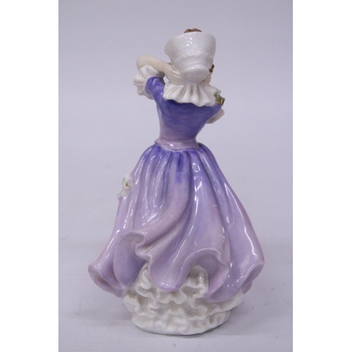 842 - A ROYAL DOULTON FIGURINE 