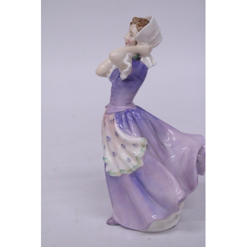 842 - A ROYAL DOULTON FIGURINE 