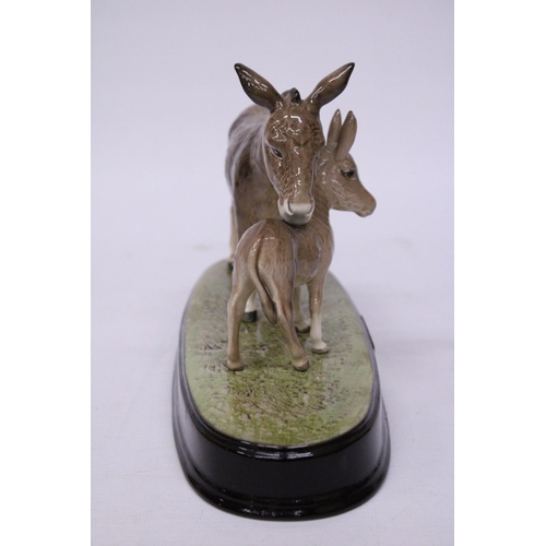 855 - A BESWICK FIGURE OF DONKEY'S 