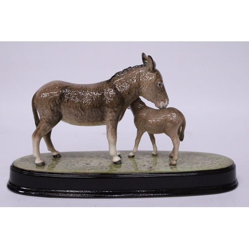 855 - A BESWICK FIGURE OF DONKEY'S 