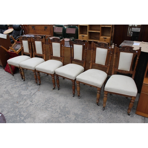 2817 - A SET OF SIX VICTORIAN CARVED OAK DINING CHAIRS WITH UPHOLSTERED SEATS AND BACKS