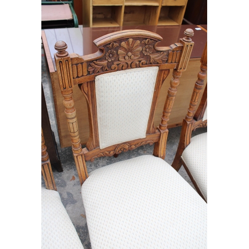 2817 - A SET OF SIX VICTORIAN CARVED OAK DINING CHAIRS WITH UPHOLSTERED SEATS AND BACKS