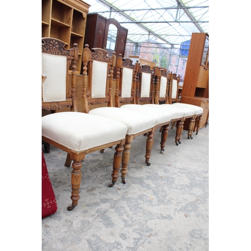 2817 - A SET OF SIX VICTORIAN CARVED OAK DINING CHAIRS WITH UPHOLSTERED SEATS AND BACKS