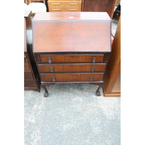 2945 - A MID 20TH CENTURY MAHOGANY BUREAU ON CABRIOLE LEGS WITH BALL AND CLAW FEET, 29.5