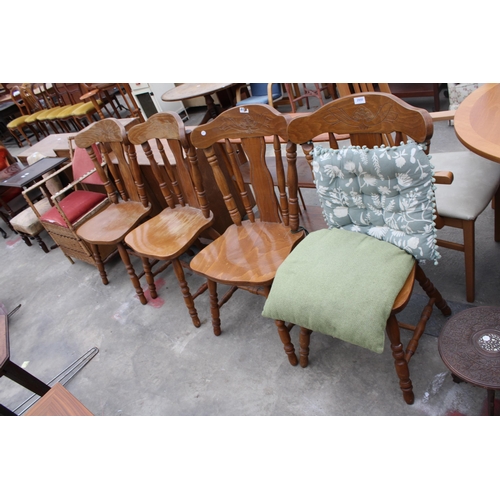 2950 - A SET OF FOUR HARDWOOD DINING CHAIRS