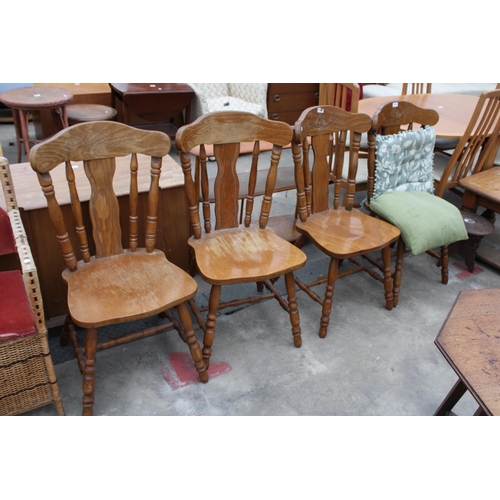 2950 - A SET OF FOUR HARDWOOD DINING CHAIRS