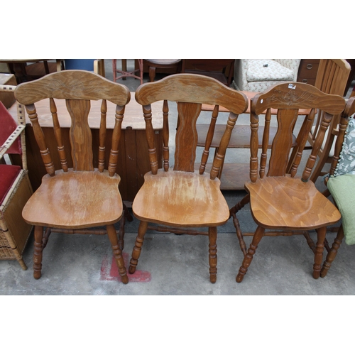 2950 - A SET OF FOUR HARDWOOD DINING CHAIRS