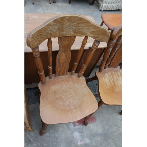 2950 - A SET OF FOUR HARDWOOD DINING CHAIRS