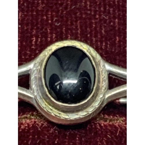 606 - A MARKED STERLING SILVER PIN BROOCH WITH BLACK STONE IN A PRESENTATION BOX