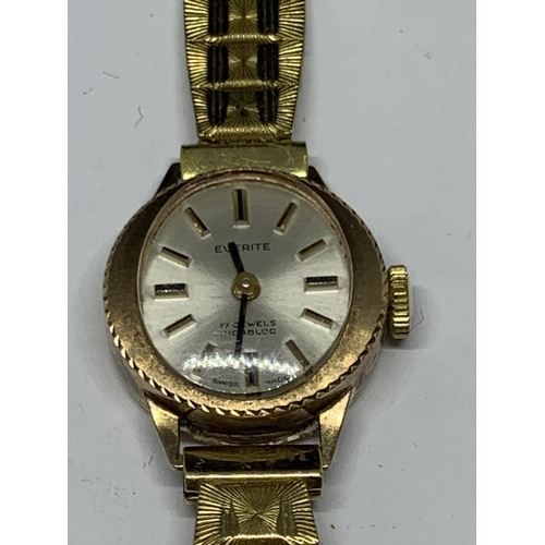 608 - A 9 CARAT GOLD CASED LADIES EVERITE 17 JEWEL INCABLOC WRISTWATCH WITH GOLD PLATED STRAP