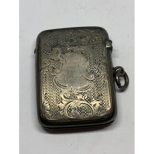 657 - A HALLAMRKED CHESTER SILVER VESTA CASE