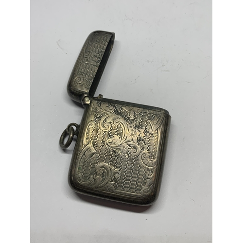 657 - A HALLAMRKED CHESTER SILVER VESTA CASE