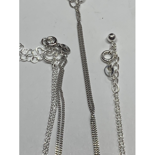 668 - FOUR MARKED SILVER NECKLACES WITH PENDANTS