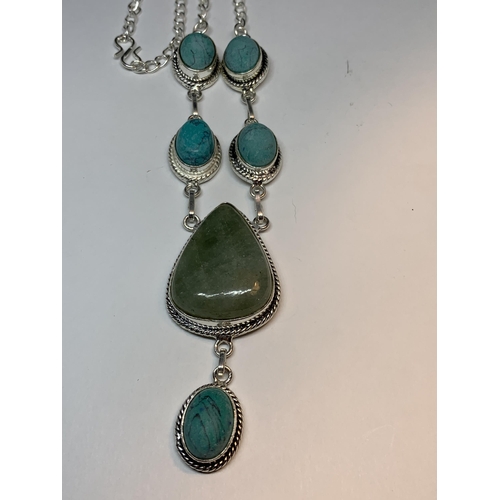 710 - A MARKED SILVER NECKLACE WITH JASPER TURQUOISE STONES