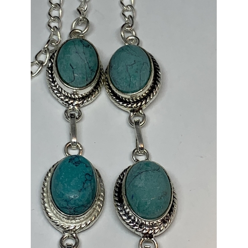 710 - A MARKED SILVER NECKLACE WITH JASPER TURQUOISE STONES