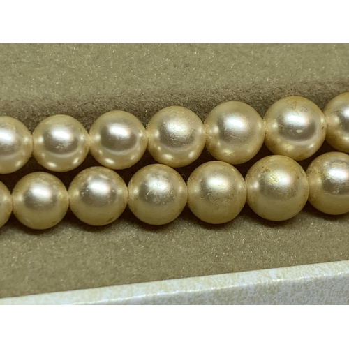 718 - A DOUBLE STRING OF LOTUS PEARLS IN A PRESENTATION BOX