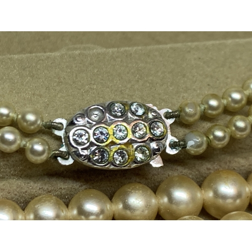 718 - A DOUBLE STRING OF LOTUS PEARLS IN A PRESENTATION BOX