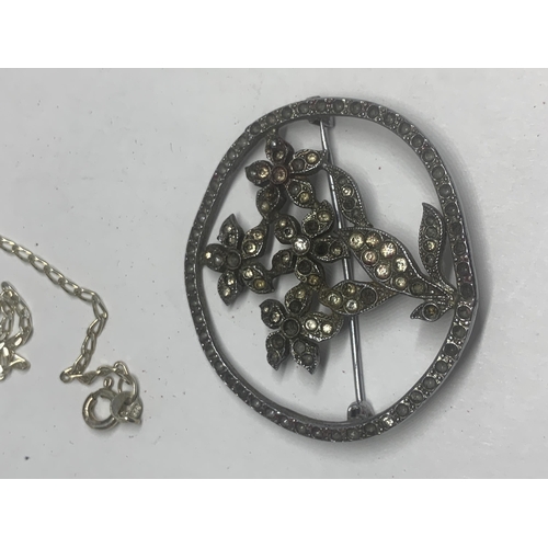 730 - A MARKED SILVER NECKLACE AND A MARCASITE STYLE BROOCH